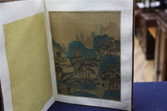 An album of twelve Chinese paintings on silk, c.1900, 36cm x 26cm